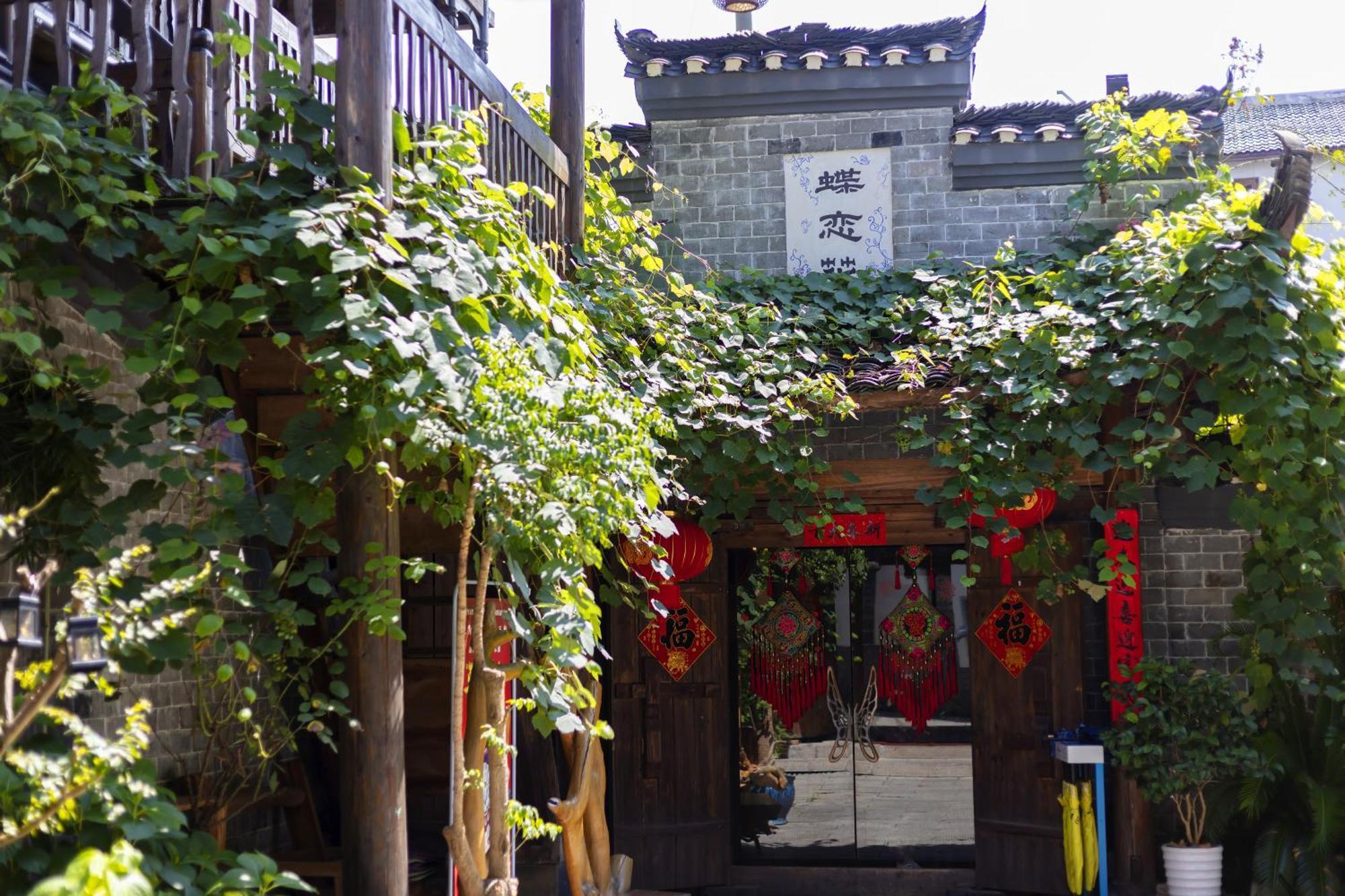 Butterfly Flowers Inn Zhangjiajie Exterior photo